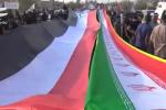 مردم بصره در راهپیمایی حمایت از ایران پرچم آمریکا را به آتش کشیدند